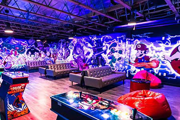 Game room with retro wall art
